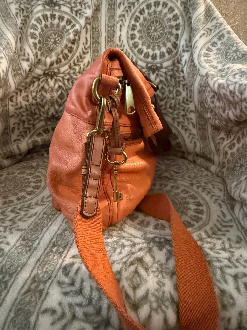 Fossil Explorer Fold Over Tote in orange on brass hardware